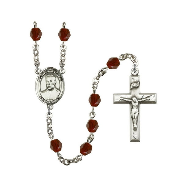 The charm features a Blessed Miguel Pro medal Patron Saint The Crucifix measures 5/8 x 1/4 Silver Plate Rosary Bracelet features 6mm Emerald Fire Polished beads The charm features a Blessed Miguel Pro medal Patron Saint The Crucifix measures 5/8 x 1/4 Silver Plate Rosary Bracelet features 6mm Emerald Fire Polished beads